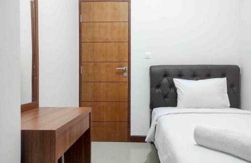 Panakkukang Apartment | Big and Comfy 3BR at Vida View Apartement By Travelio