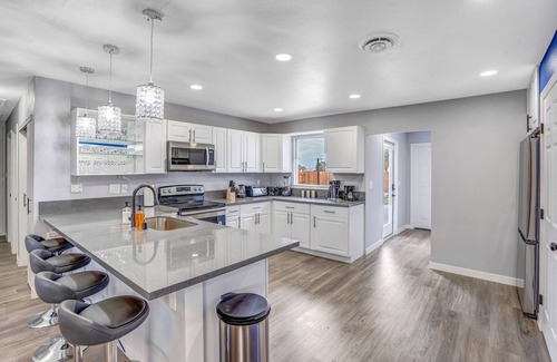 North Las Vegas House | Big Groups Retreat: Remodeled, Landscaped, King Beds, Desks, BBQ, Games