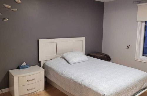 Laval House | Big house with garage, patio and backyard