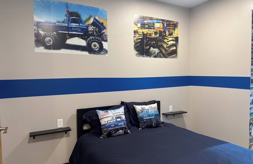 Pacific Hotel | Bigfoot Monster Truck Suite with kitchenette and onsite activities