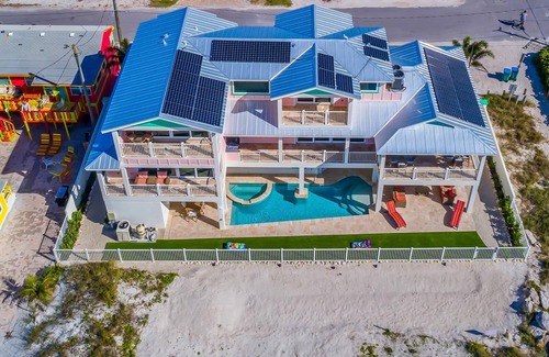 Ilexhurst House | Bikini's & Martini's Beachfront: Direct Gulf Front! Pool, Spa, Pro-Series Loaded Game Room & Arcade