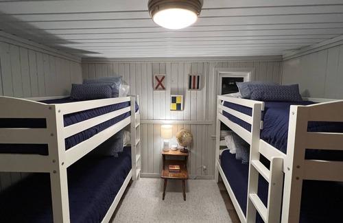 Alden Cottage | Birch Cottage Torch Lake Waterfront with Sunset Views, Kayaks and Paddleboards