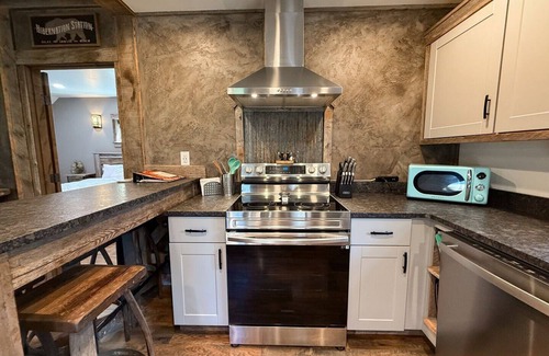 Whitefish House | Bison Ridge Cabin #1 | Pet Friendly | 4BR Getaway w/Hot Tub, Fire Pit & Grill | Sleeps 8!