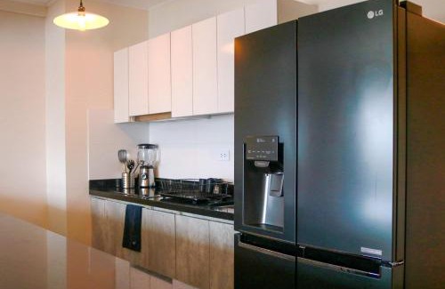 San Isidro Centro Financiero Apartment | Black by Wynwood House