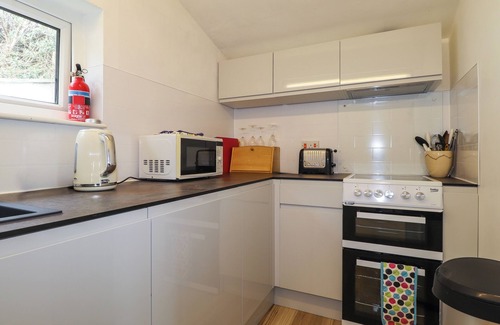St Brides Cottage | BLACKROCK BOATHOUSE, country holiday cottage, with a garden in Dale
