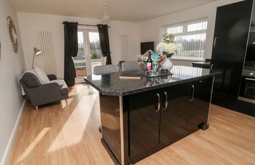 Shilbottle Cottage | BLACKSMITHS COTTAGE, pet friendly, with a garden in Shilbottle