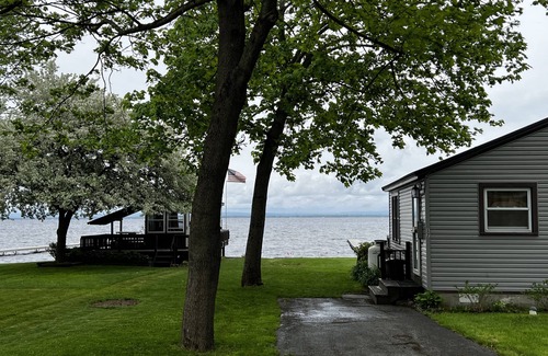 Bernhards Bay Cottage | Bliss by the Bay. Oneida Lake, stunning waterfront views, dock, cozy interior