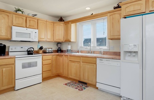 Captain's Cove House | Bliss by the Bay, pet friendly waterfront home with fireplace