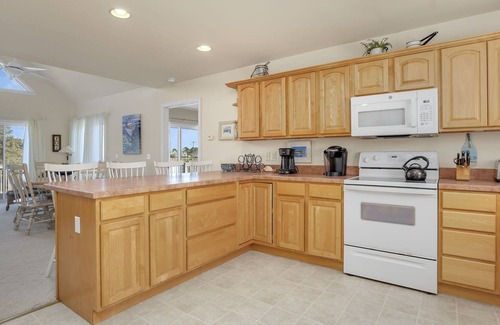 Captain's Cove House | Bliss by the Bay, pet friendly waterfront home with fireplace