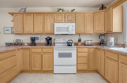 Captain's Cove House | Bliss by the Bay, pet friendly waterfront home with fireplace