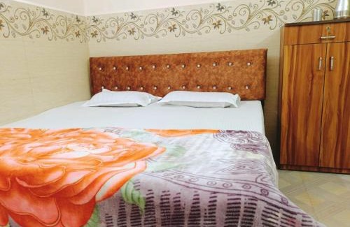 Mulgao Hotel | Blue building Service Apartments and kitchen Facility