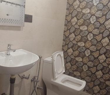 Mulgao Hotel | Blue building Service Apartments and kitchen Facility