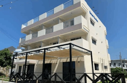 Maeganeku Apartment | Blue Entrance