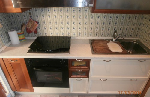 Porto Azzurro Apartment | Blue harbor lovely apartment with terrace above the beach.