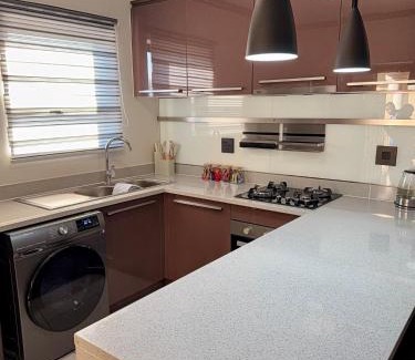 Greater Johannesburg Metropolitan Area Apartment | Blue lake estate Luxury and modern apartment with free WiFi and air conditioning close to Mall of Africa and Waterfall Corner