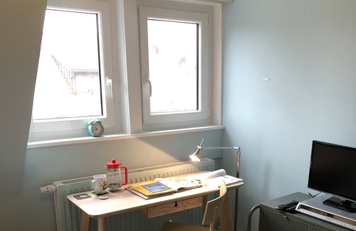Mainstockheim House | Blue Room with balcony: remodeled historical room of a school teacher with bath