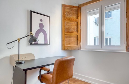 Santo Condestavel Apartment | Blueground | Campo de Ourique, fully furnished