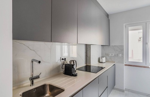 Santo Condestavel Apartment | Blueground | Campo de Ourique, AC & balcony, nr Estrela
