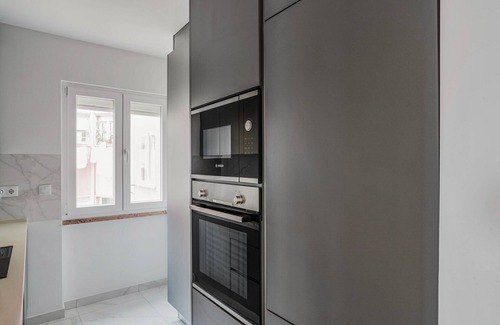 Santo Condestavel Apartment | Blueground | Campo de Ourique, AC & balcony, nr Estrela