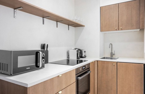 Quartier de Rochechouart Apartment | Blueground | Pigalle, elev & w/d, nr Sacré-Cœur