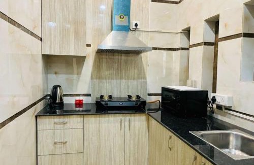 DLF City Apartment | BluO 1BHK - DLF CyberCity, Balcony, Lift, Parking