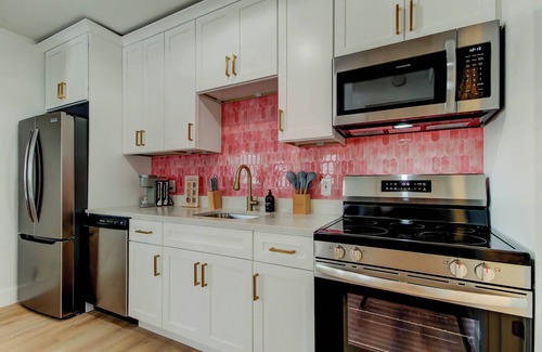 St. Petersburg - Clearwater Cottage | Blushing Flamingo- Triplex with heated pool, across the street from the beach