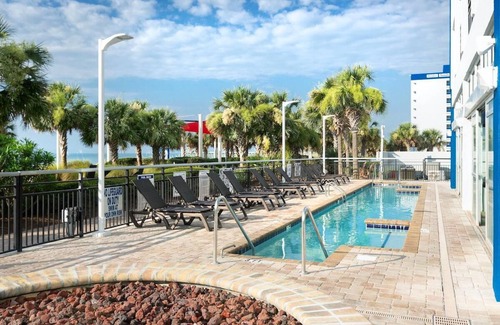 Downtown Myrtle Beach Apartment | Boardwalk Breeze: Oceanfront Room with King Bed