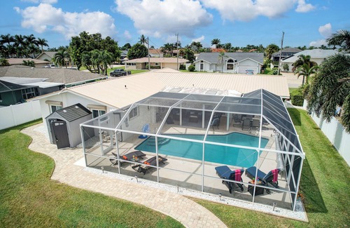 Caloosahatchee House | Boater’s Delight! 4BR Tropical Canal Retreat with Direct Gulf Access