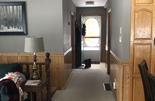 Novar Cottage | Boathouse Cottage on the water, access to snowmobile trails and ice fishing.