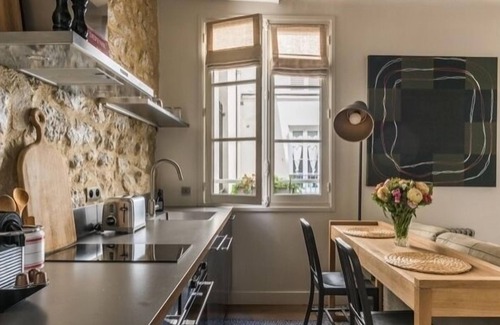 Saint-Thomas-d'Aquin Apartment | Bohemian chic Duplex in the heart of Saint Germain