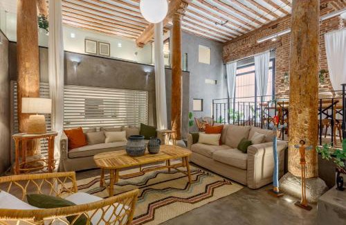 Barrio de La Latina Apartment | Boho-Chic Loft in a Legendary 17th-Century 'Trap House