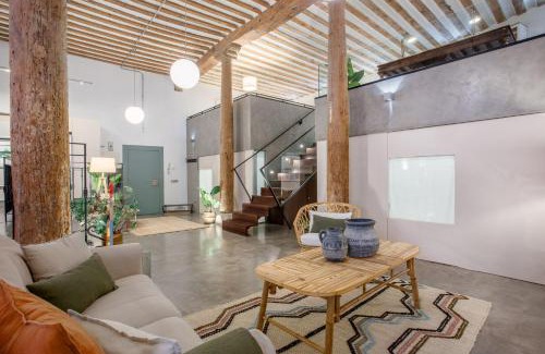 Barrio de La Latina Apartment | Boho-Chic Loft in a Legendary 17th-Century 'Trap House