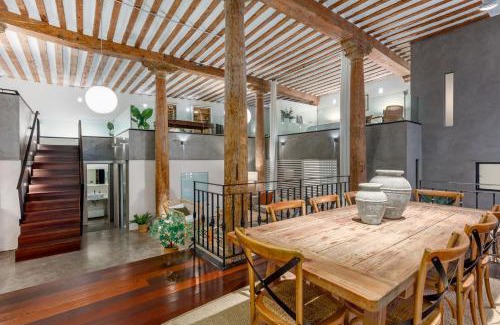 Barrio de La Latina Apartment | Boho-Chic Loft in a Legendary 17th-Century 'Trap House