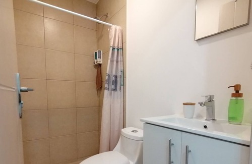 Heredia Apartment | BOHO CHIC STYLE CONDO, NEAR THE AIRPORT W/ SELF CHECK-IN