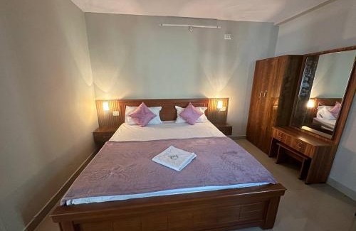 Shaikpet Apartment | Boho Nest -Aesthetic 2BHK with Smart TV, Kitchen, Cozy Bedrooms & Peaceful Ambience