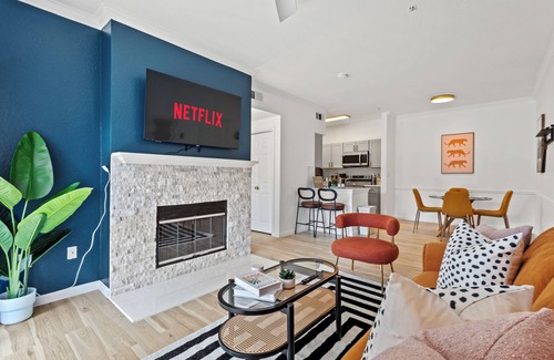 Dallas Condo | Bold & Bright Uptown Pad - Pool Dining Vibes