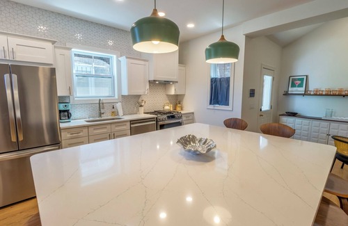 Michigan City House | Bold & Fun Getaway Steps from Train & Beach