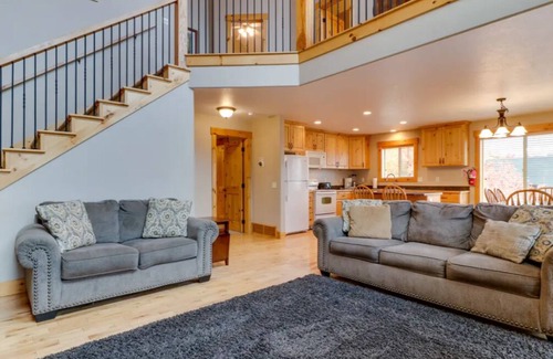 Harbor Village Cabin | Book your stay today! Experience amazing views of Bear Lake at Deja View (sleeps 20)