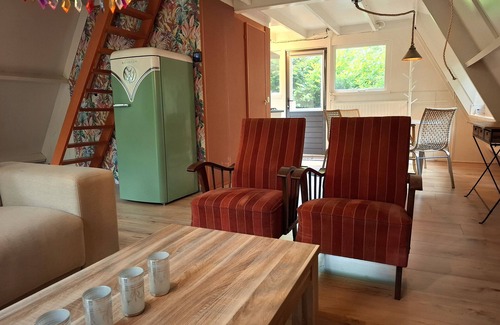 Rekem Ski Chalet | Bosrijk gelegen vakantiehuis met optimale privacy!