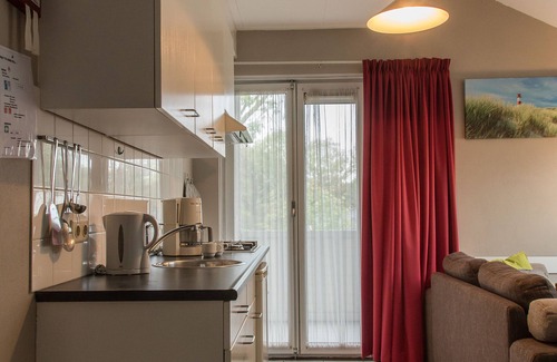 Oostkapelle Apartment | Boszicht 4 aan de Kust luxury apartment 4 people. Beach 800 mtr