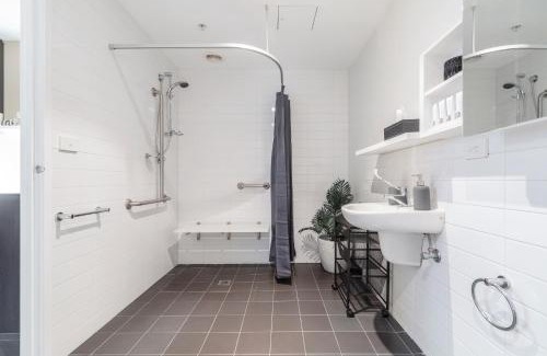 Melbourne Central Business District Apartment | Boutique Retreat in Heart of CBD Mobility-Friendly