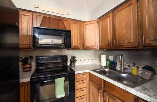 Boyne Falls Apartment | Boyne Mtn Views! 2BR w/Patio & Fire Pit Access