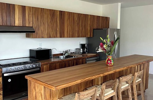 Santa Maria Huatulco Condo | Brand New 2-bedroom condo in Santa Cruz. Private roof top terrace with pool.
