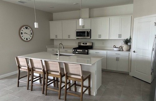 Estero House | Brand New! 4 Bedroom home with a Heated pool in Gated Community