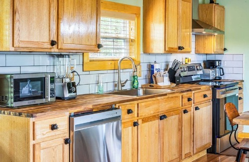Sevierville Cabin | BRAND NEW! Cozy 2-bedroom Tiny Cabin with no steep roads