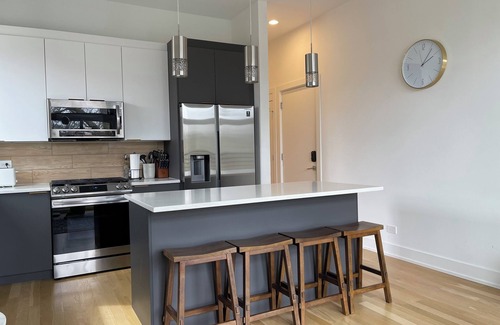 Jefferson Park Condo | Brand new luxury space + roof deck in enchanting Chicago, with hi-speed WiFi.