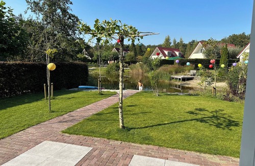 Havelte House | Brand new spacious home, with sunny garden flush with natural swimming water