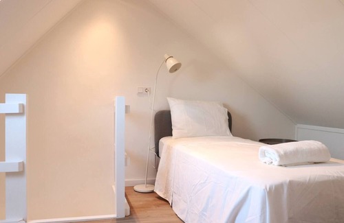 Municipality of Tilburg Apartment | Brand new two-floor house with living room, kitchen, bedroom, and bathroom.