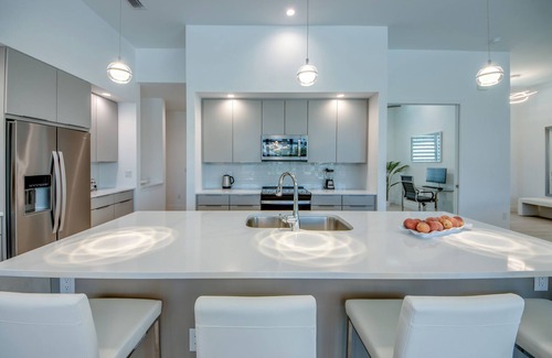 Fort Myers Villa | Brand-new villa for families heated saltwater pool+spa on the canal facing south