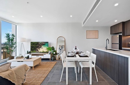 Lidcombe Apartment | Breathtaking Views! Modern 2BR: Pool, Parking, Gym